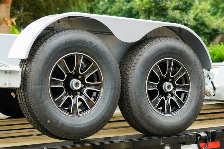 Close up of wheels on a Good flatbed trailer.