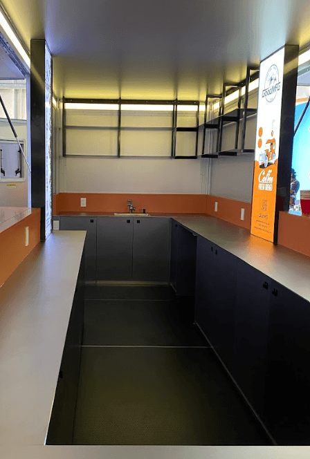 The interior of a 19 foot food trailer.