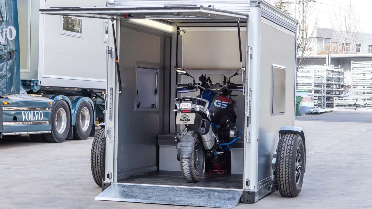 Motorcycle loaded into cargo trailer