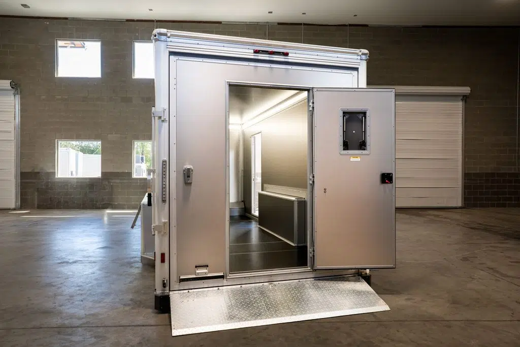Landscaping trailer - GT19AL drop deck enclosed trailer lowered all the way to the ground.