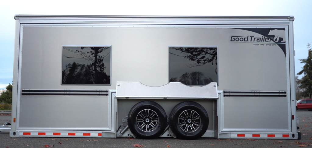 A Good Trailer sitting flat on the ground, ready for loading or unloading.