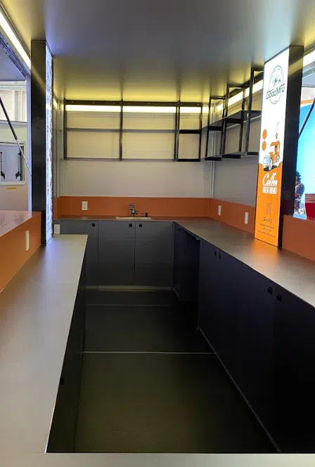 The interior of a 19 foot food trailer.